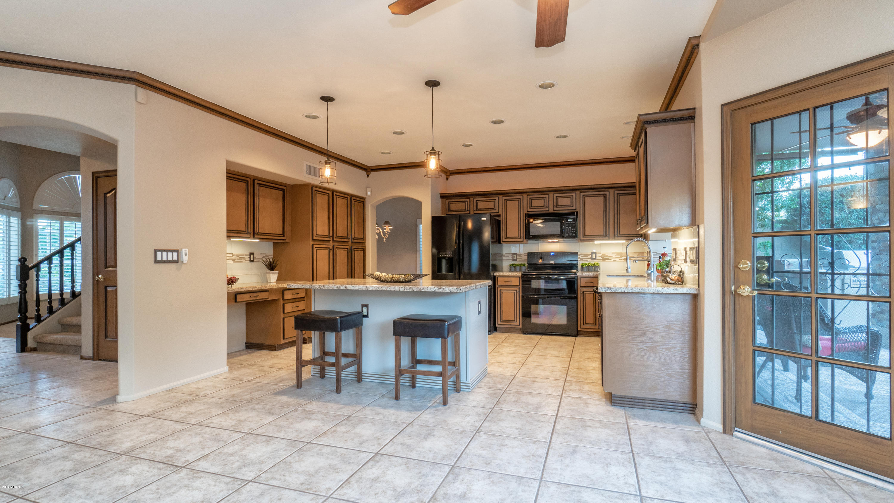 1622 East Nighthawk Way Phoenix, AZ 85048 - Photo 24 of 58 Family Room with Patio Access