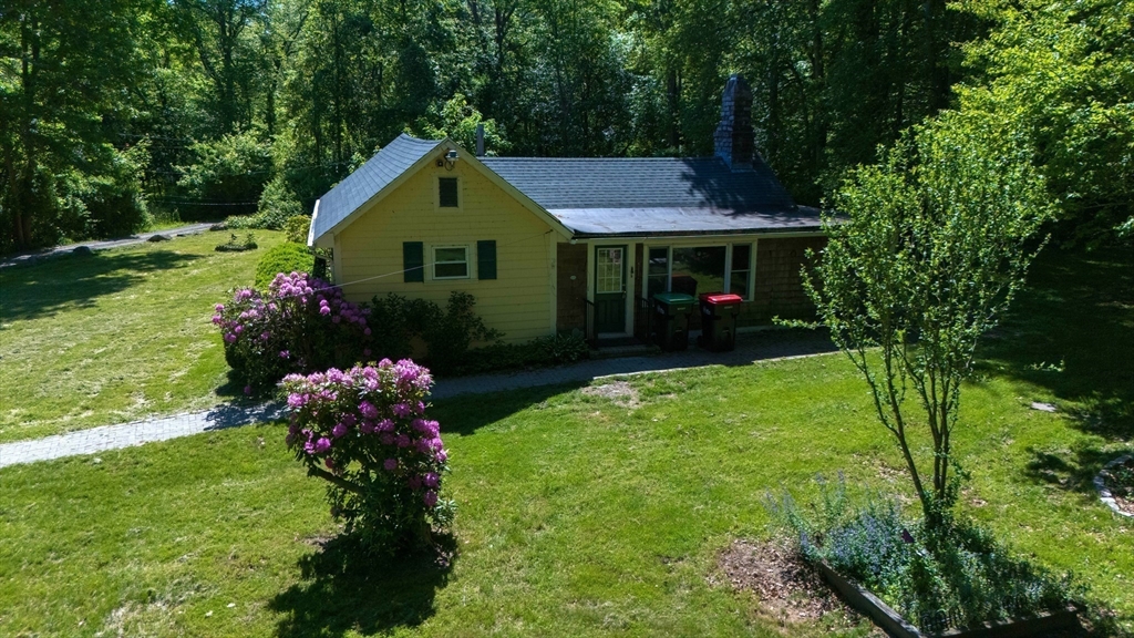 217-bb Tickle Road Westport, MA 02790 - Photo 9 of 24 a front view of house with garden