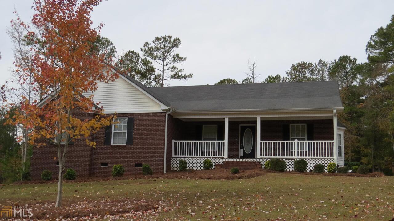 147 Mabry Road Jackson, GA 30233 - Photo 1 of 1 a view of a house with a yard and large tree