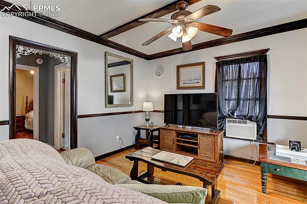 312 10th Street Fowler, CO 81039 - Photo 11 of 35 a bedroom with furniture or bed and a flat screen tv