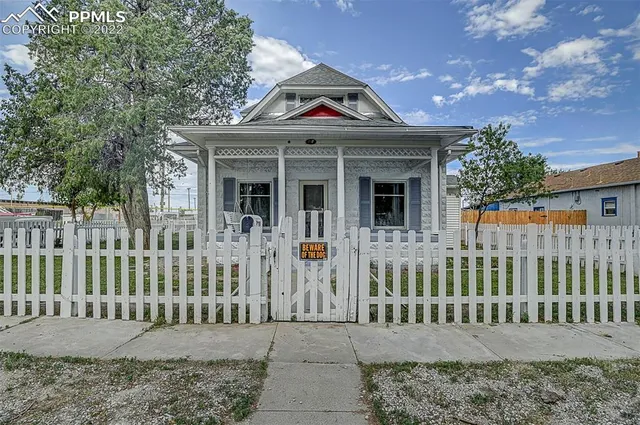 a front view of a house with a porch
