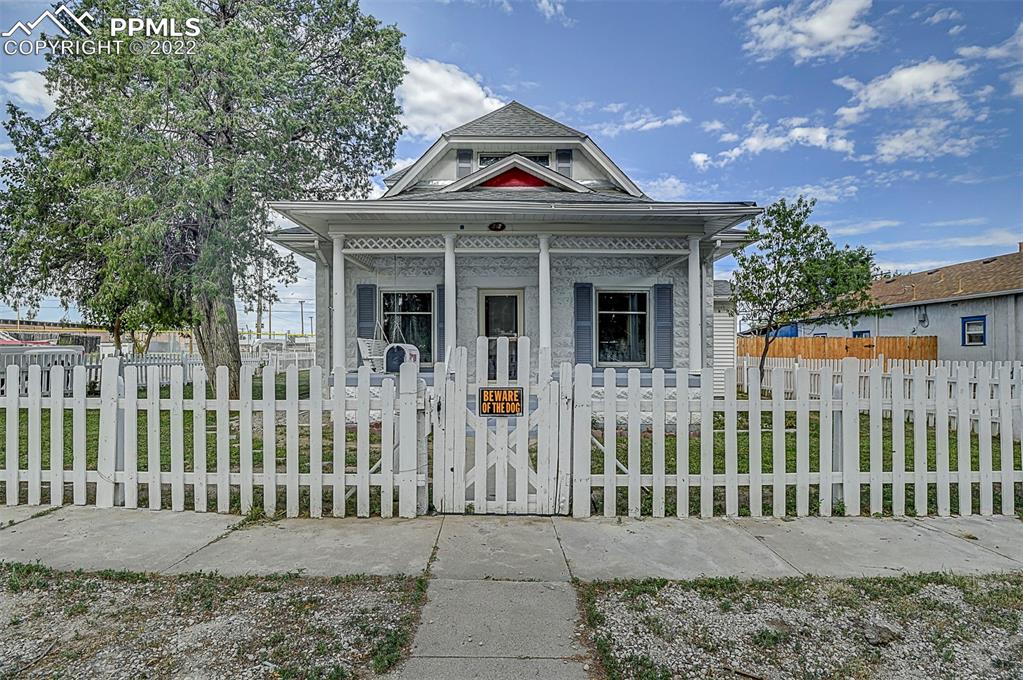 312 10th Street Fowler, CO 81039 - Photo 3 of 35 a front view of a house with a porch
