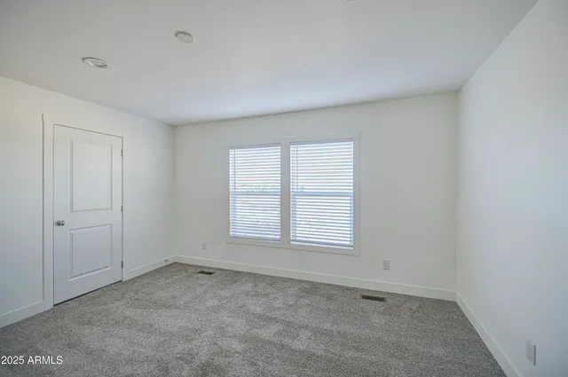 a view of walk in closet with window