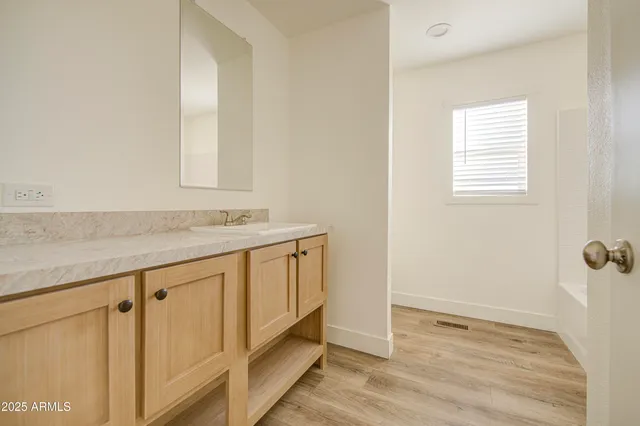 a bathroom with a toilet and a sink