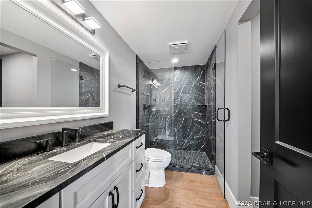 1356 Duckhead Road Lake Ozark, MO 65049 - Photo 60 of 99 Floor to celing large format tile