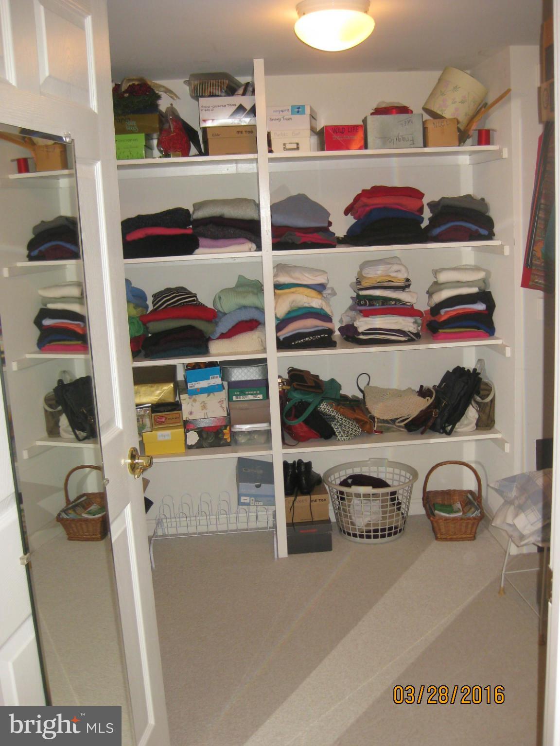 12310 Rosslare Ridge Road, Unit 404 Lutherville-Timonium, MD 21093 - Photo 20 of 23 Master BR Walk-in Closet