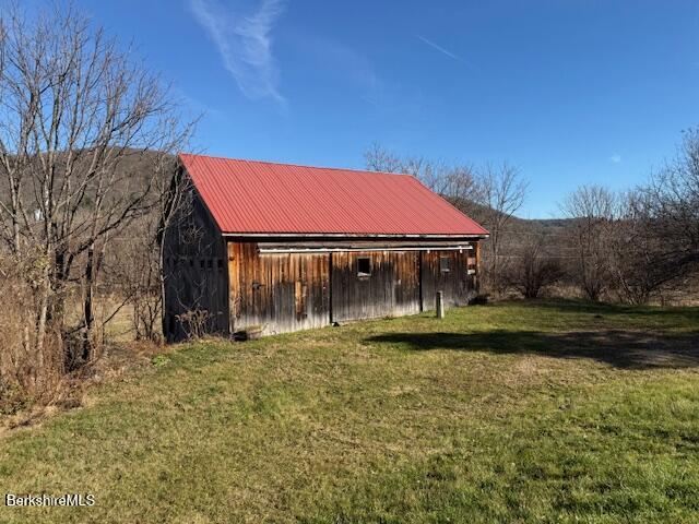 34 Ny Route Petersburg, NY 12138 - Photo 12 of 59 a front view of a house with a garden