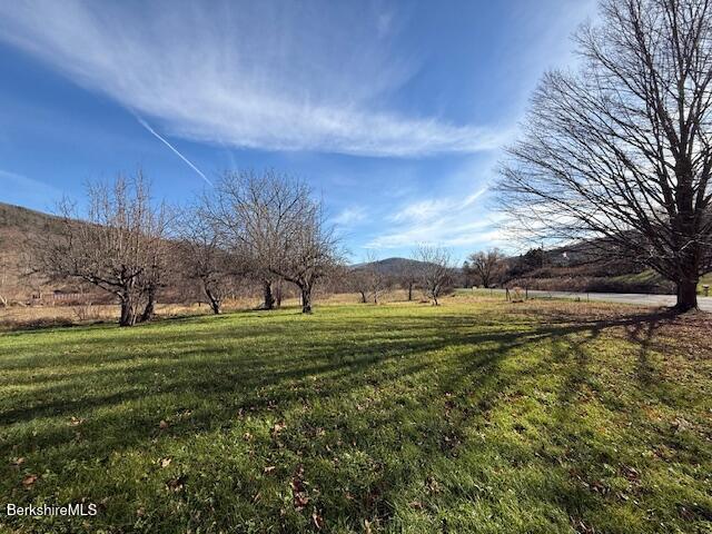 34 Ny Route Petersburg, NY 12138 - Photo 13 of 59 a view of a golf course with a lake