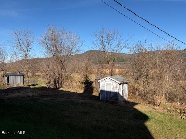 34 Ny Route Petersburg, NY 12138 - Photo 14 of 59 a backyard of a house with lots of green space