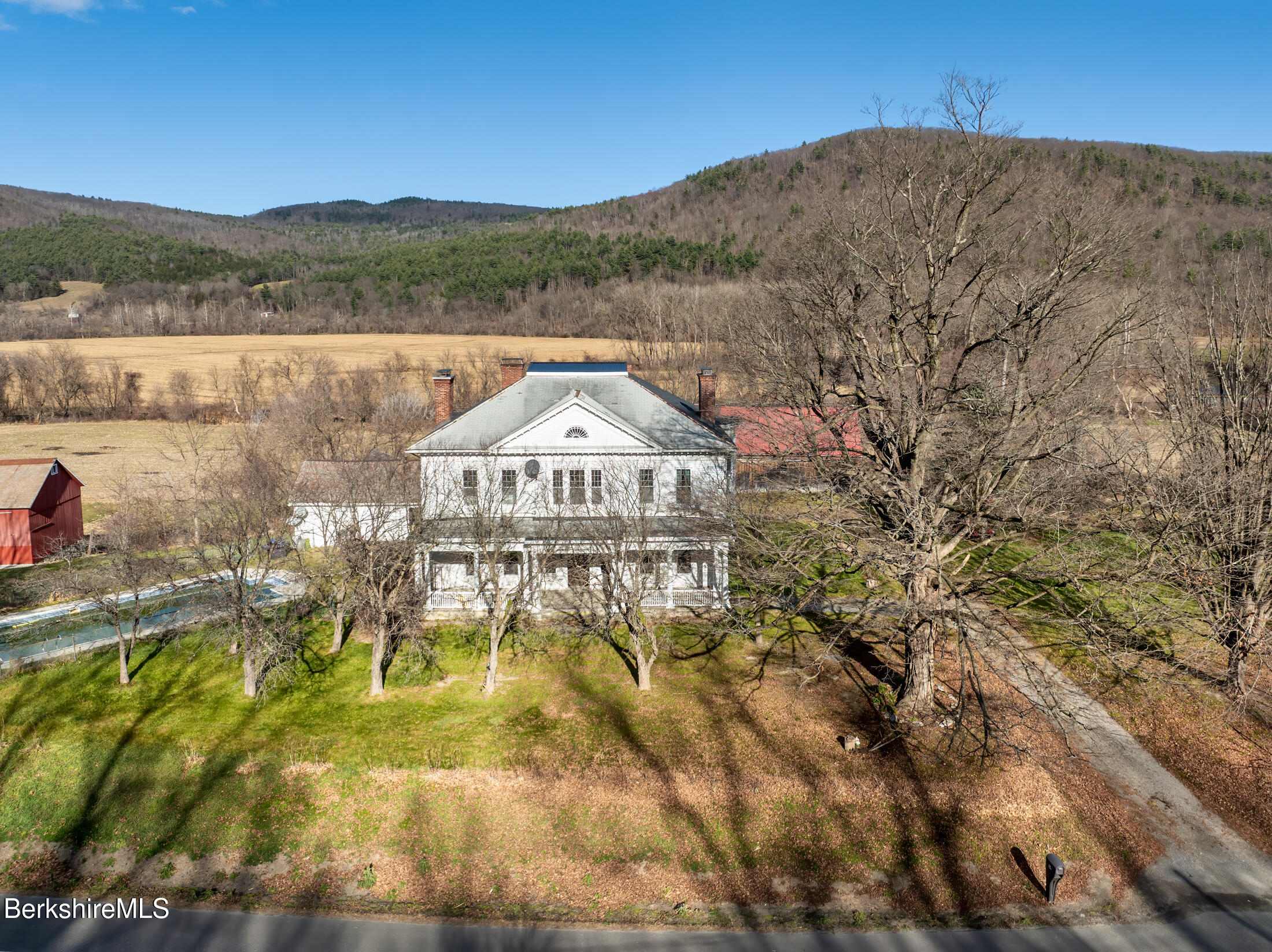 34 Ny Route Petersburg, NY 12138 - Photo 2 of 59 a view of a lake with a mountain in the background