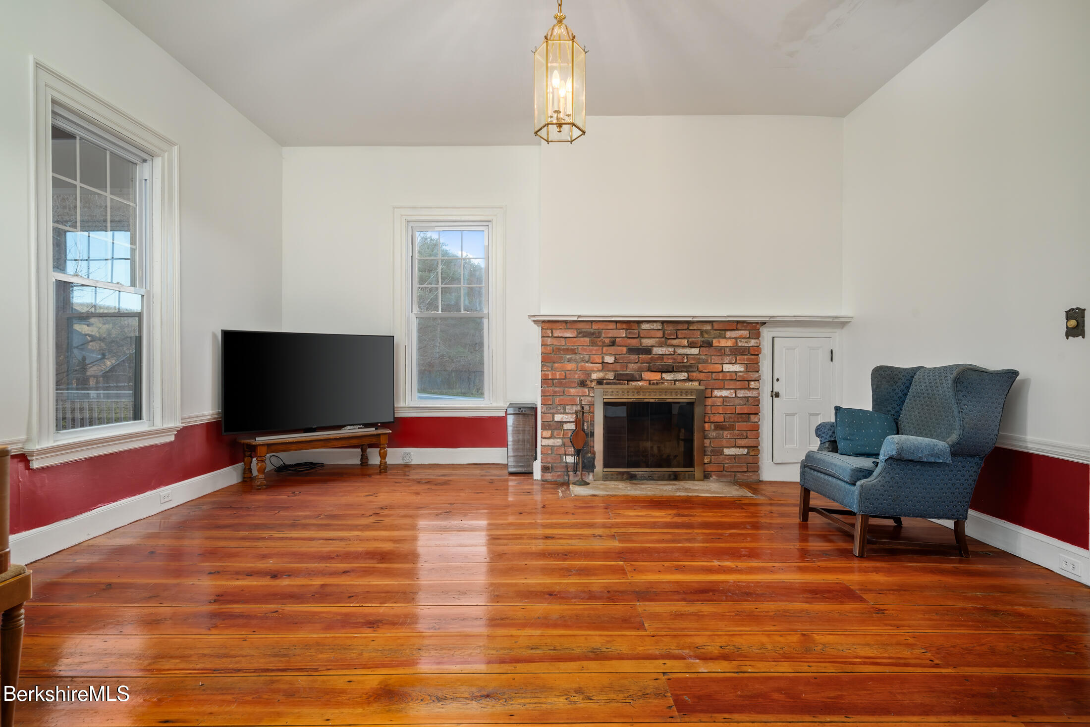 34 Ny Route Petersburg, NY 12138 - Photo 31 of 59 a living room with furniture and a fireplace