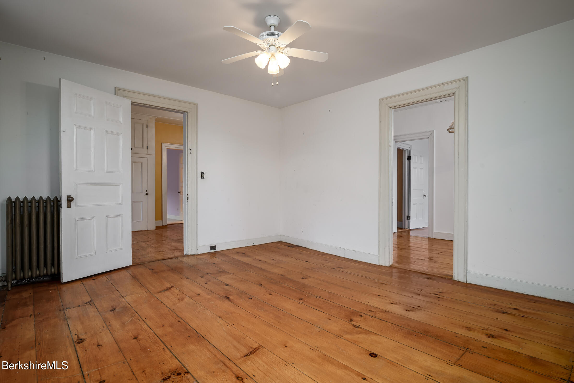 34 Ny Route Petersburg, NY 12138 - Photo 40 of 59 a view of empty room with wooden floor and fan
