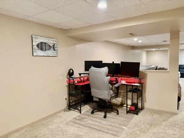an empty room with shelves
