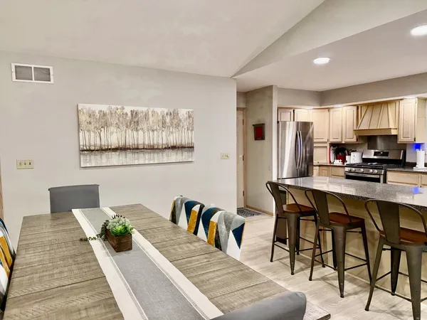 a view of a dining room with furniture