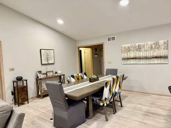 a view of a dining room with furniture