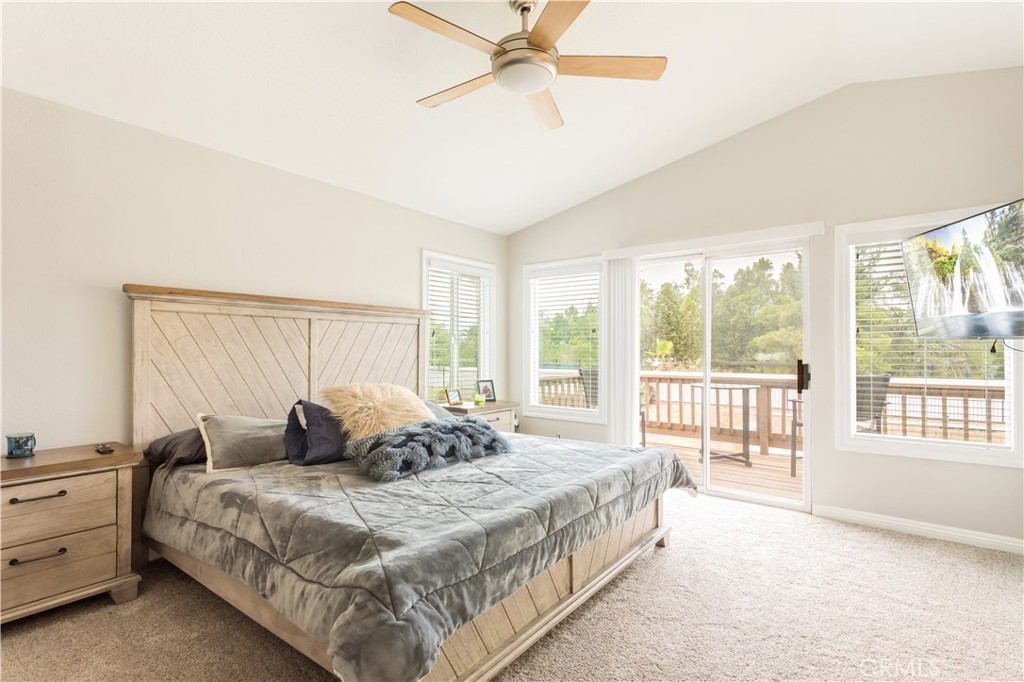 934 Mission Grove Riverside, CA 92506 - Photo 17 of 28 a bedroom with a bed and a large window