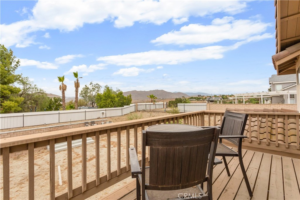 934 Mission Grove Riverside, CA 92506 - Photo 19 of 28 a view of a balcony with wooden benches