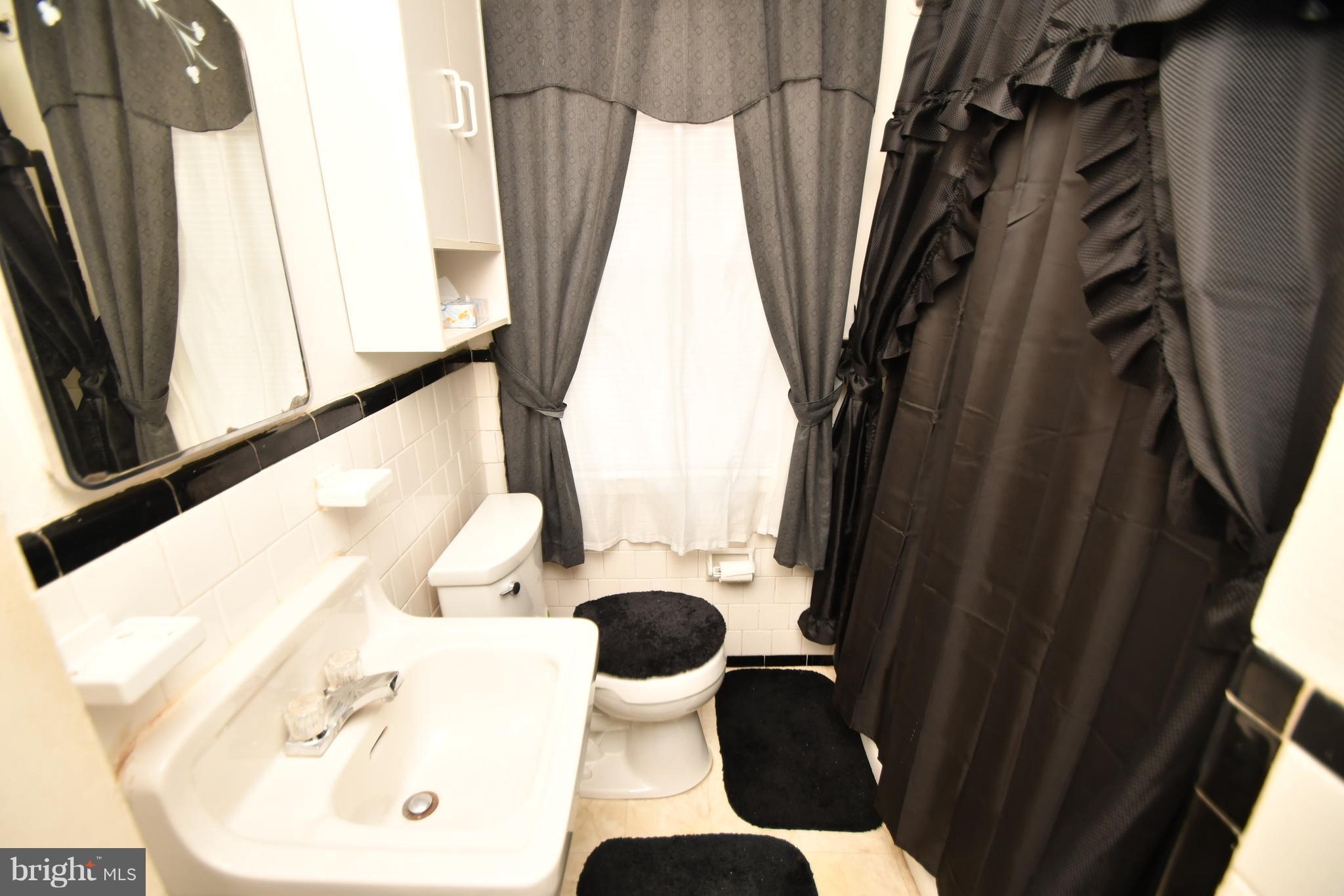 25 Cardinal Road Baltimore, MD 21221 - Photo 19 of 28 Full bath w/ceramic tile and full size shower