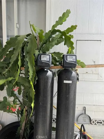 a view of a storage & utility room with a window