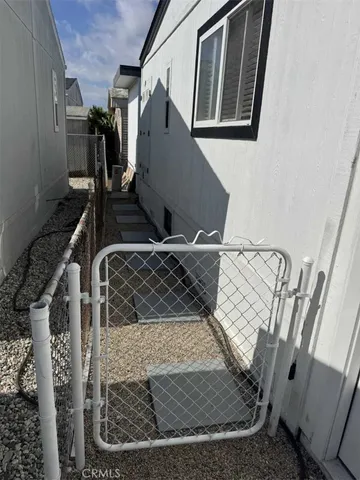 a living room with furniture and flowers