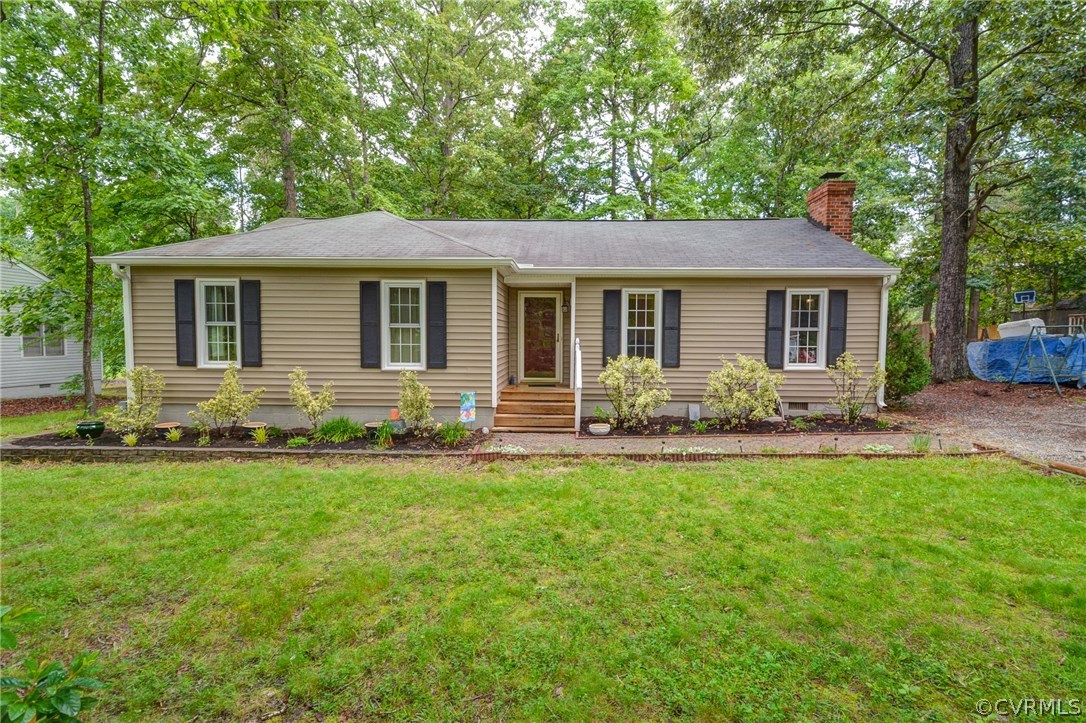4906 Rollingway Road Chesterfield, VA 23832 - Photo 2 of 34 a front view of house with yard and green space
