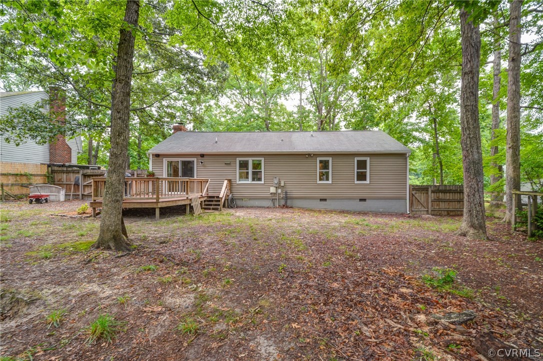 4906 Rollingway Road Chesterfield, VA 23832 - Photo 31 of 34 a view of a house with backyard and chairs
