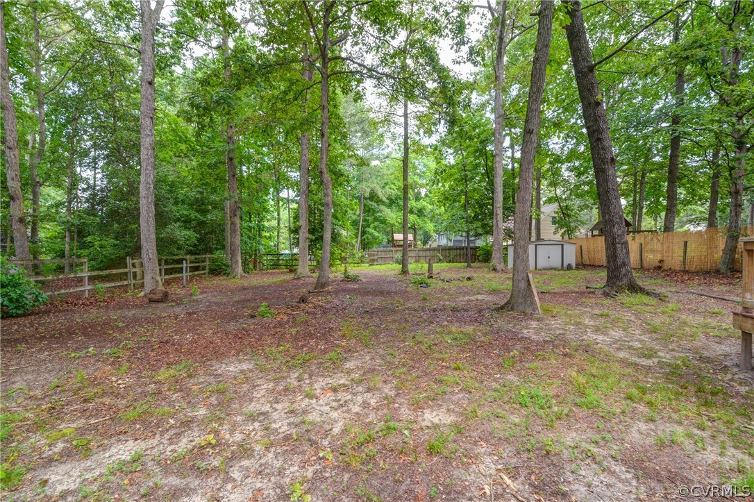 4906 Rollingway Road Chesterfield, VA 23832 - Photo 34 of 34 a view of a yard with a tree