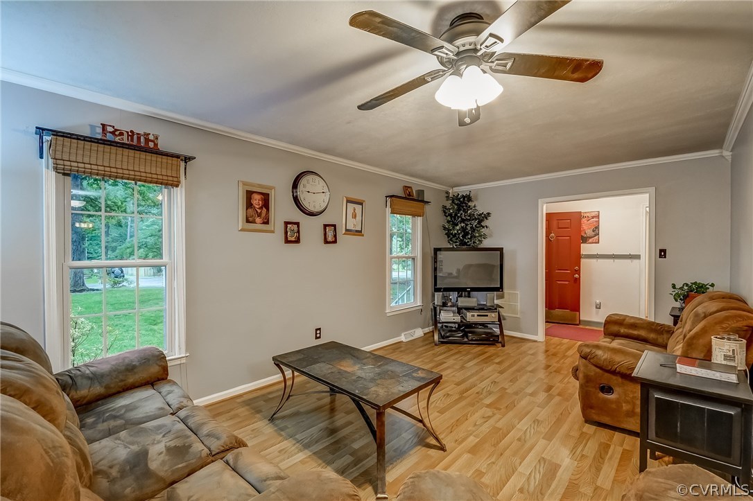4906 Rollingway Road Chesterfield, VA 23832 - Photo 5 of 34 a living room with furniture and a window