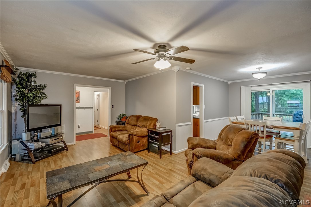 4906 Rollingway Road Chesterfield, VA 23832 - Photo 6 of 34 a living room with furniture and a flat screen tv