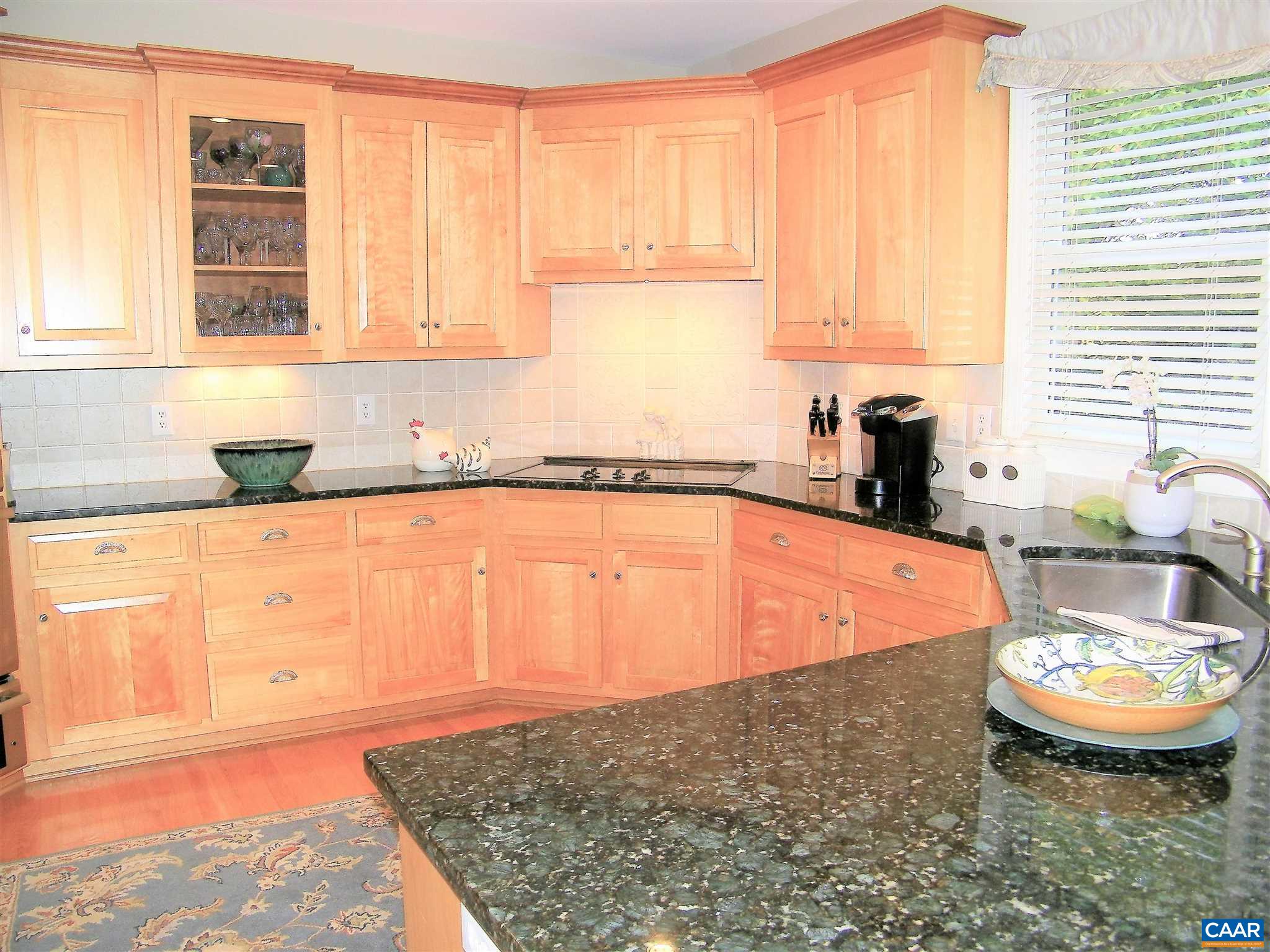 3 Old Farm Road Charlottesville, VA 22903 - Photo 15 of 66 a kitchen with stainless steel appliances granite countertop a sink a stove and a wooden cabinets