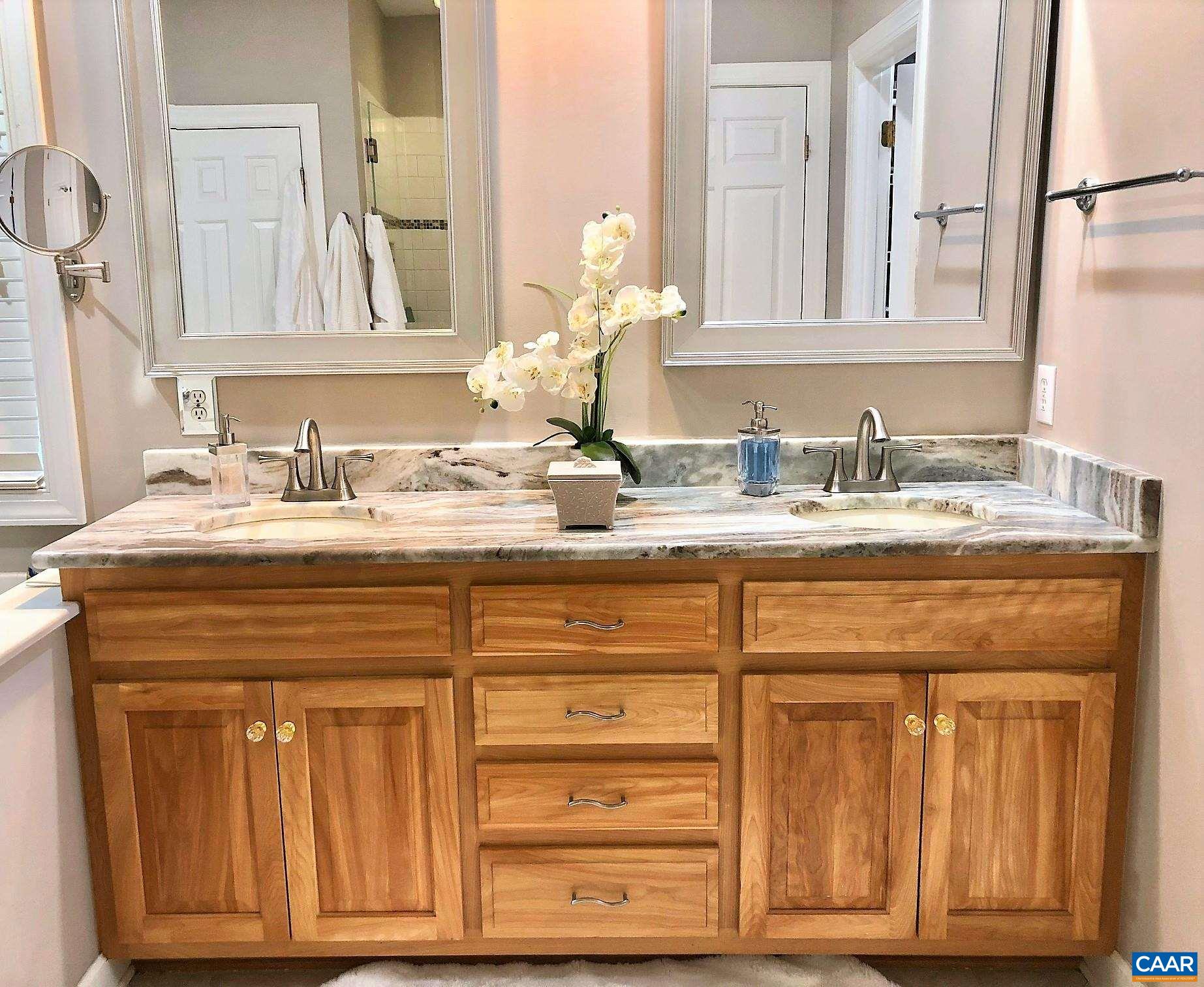 3 Old Farm Road Charlottesville, VA 22903 - Photo 28 of 66 a bathroom with a sink vanity and a mirror