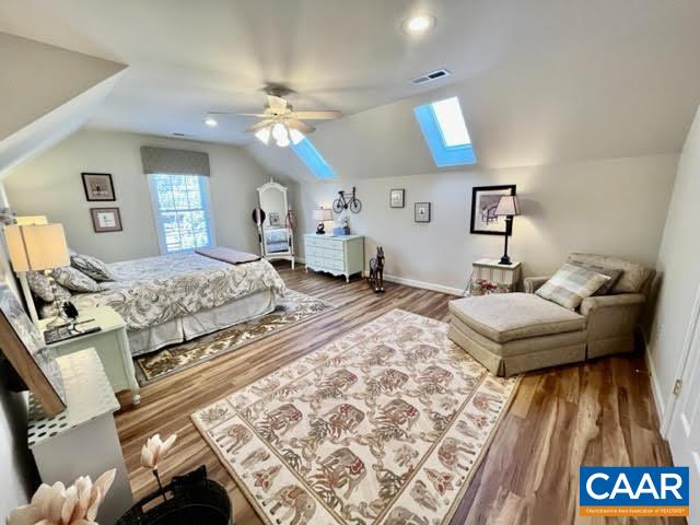 3 Old Farm Road Charlottesville, VA 22903 - Photo 34 of 66 a bedroom with a bed and wooden floor