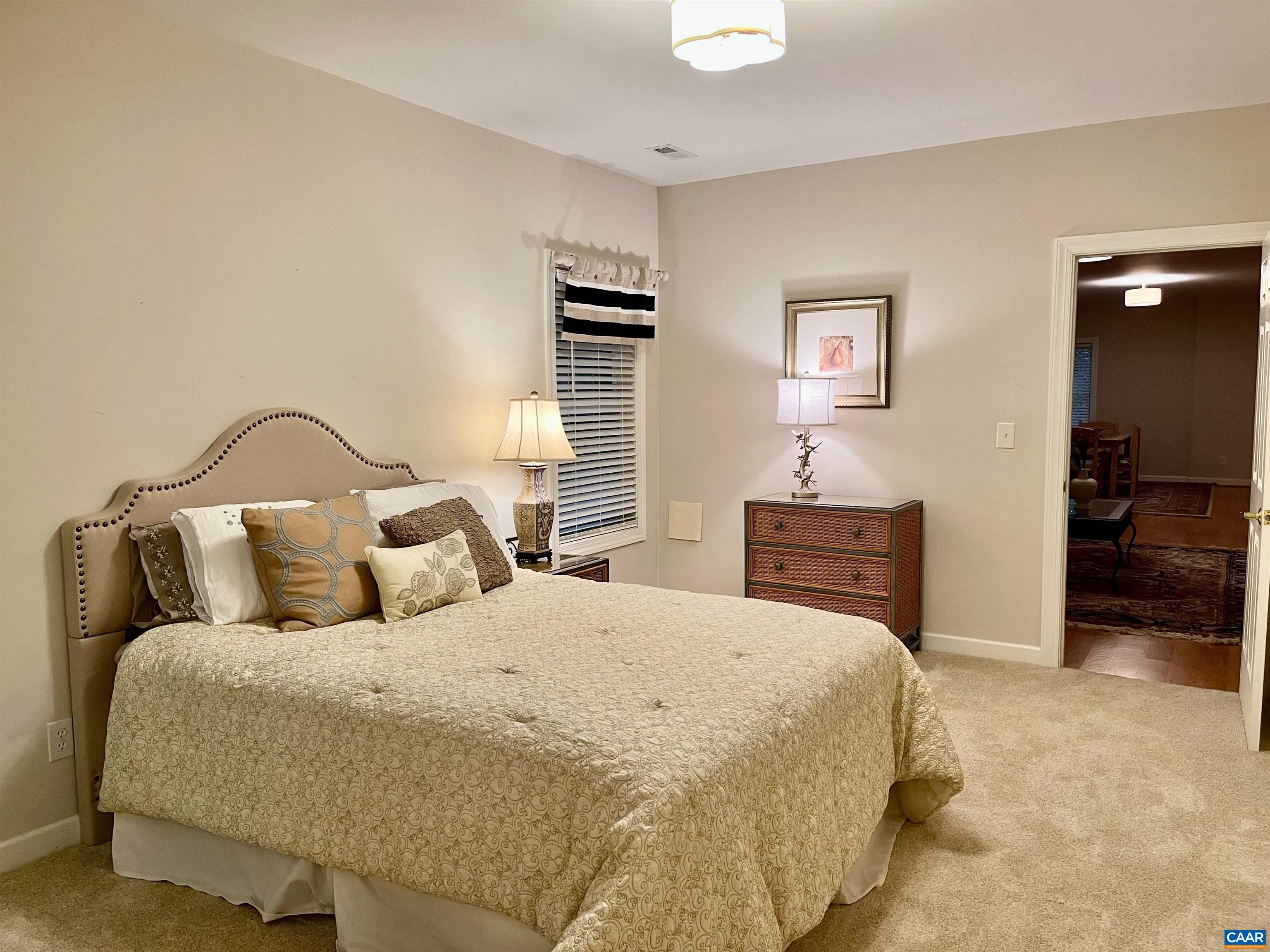 3 Old Farm Road Charlottesville, VA 22903 - Photo 50 of 66 a bedroom with a bed and a television