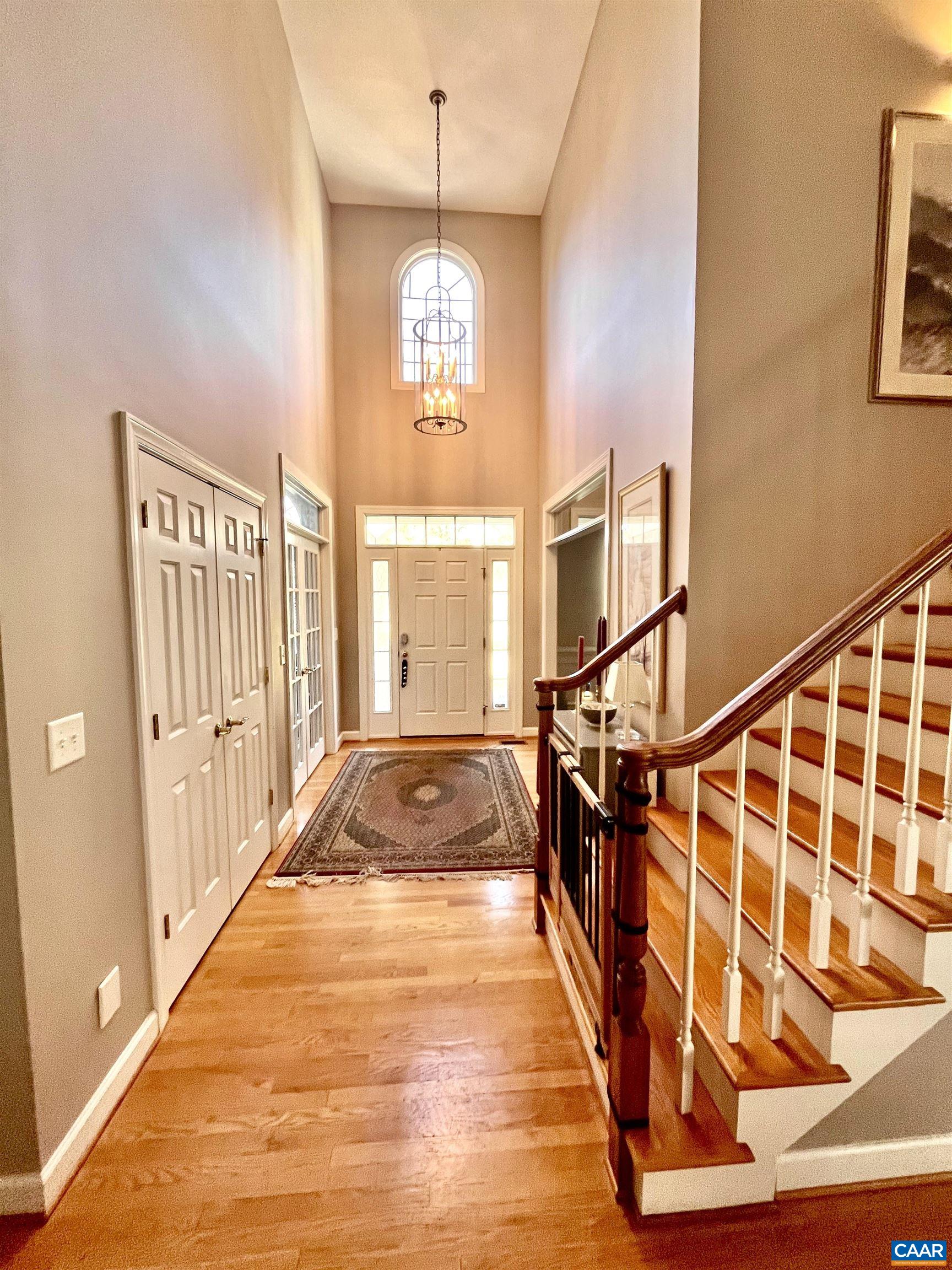 3 Old Farm Road Charlottesville, VA 22903 - Photo 6 of 66 a view of entryway and hall with wooden floor