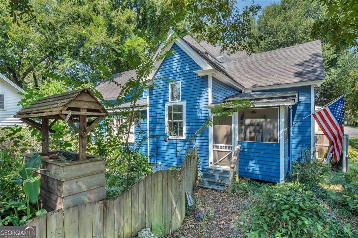 212 East Union Street Vienna, GA 31092 - Photo 60 of 62 a front view of a house with a yard