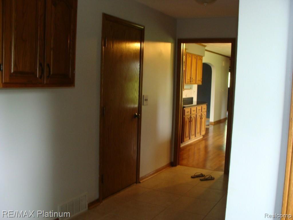 3975 Bigelow Road Howell, MI 48855 - Photo 21 of 26 Laundry and Mud Room coming off Garage and leading to back door