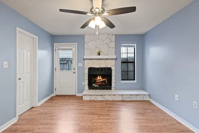 a kitchen with granite countertop a sink stainless steel appliances and counter space