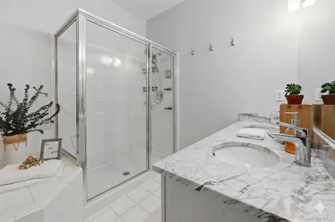 a bed room with a bed and a window