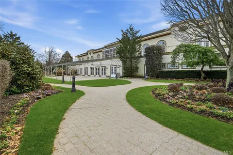 a view of a lake with a garden