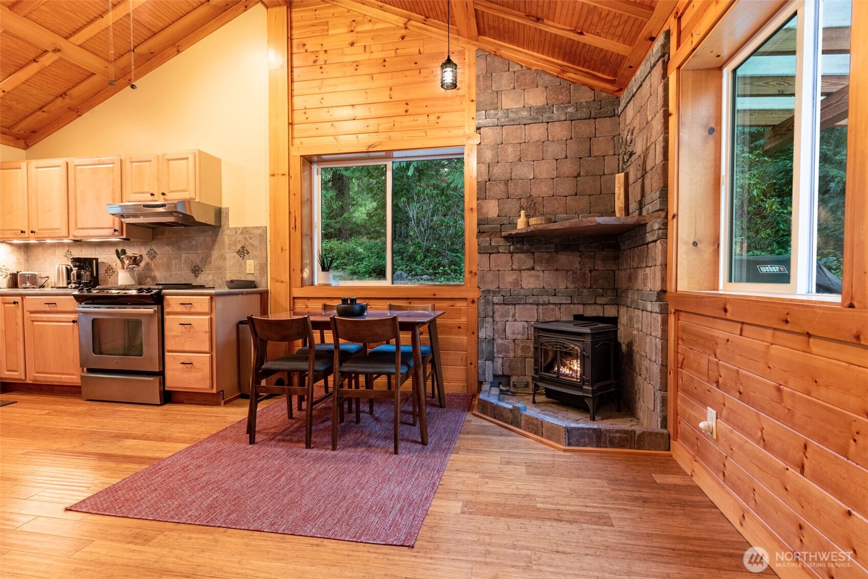 744 Tarte Road Friday Harbor, WA 98250 - Photo 11 of 35 a view of a dining room with furniture window and wooden floor