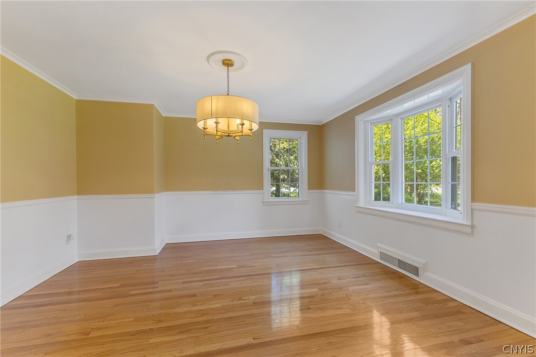 31 Lyndon Road Fayetteville, NY 13066 - Photo 9 of 47 Formal dining room has a newer chandelier.