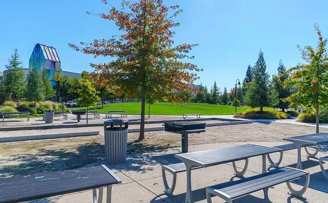 swimming pool view with a seating space