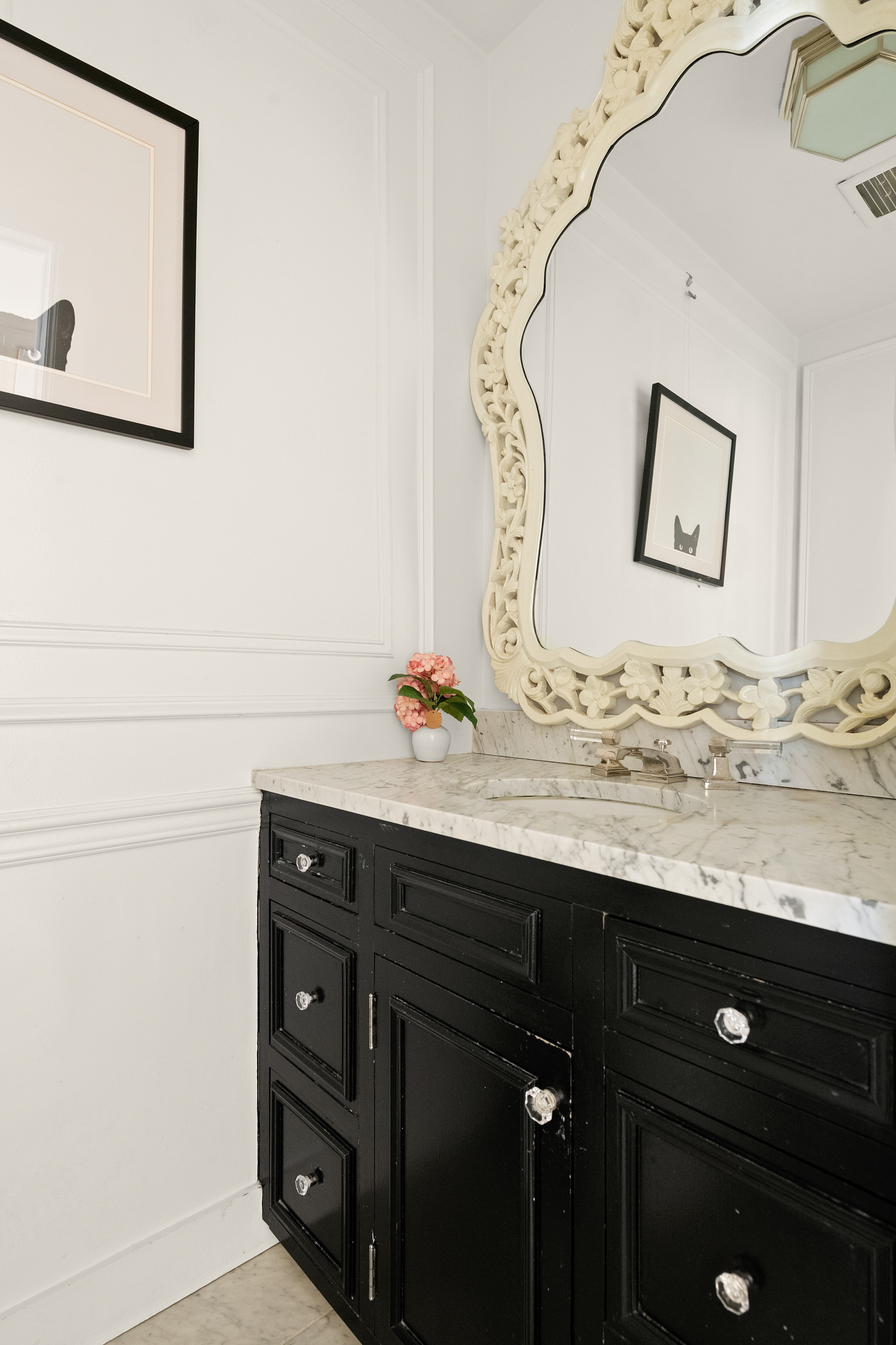 51 East 75th Street Manhattan, NY 10021 - Photo 16 of 22 a bathroom with a granite countertop sink a mirror and vanity