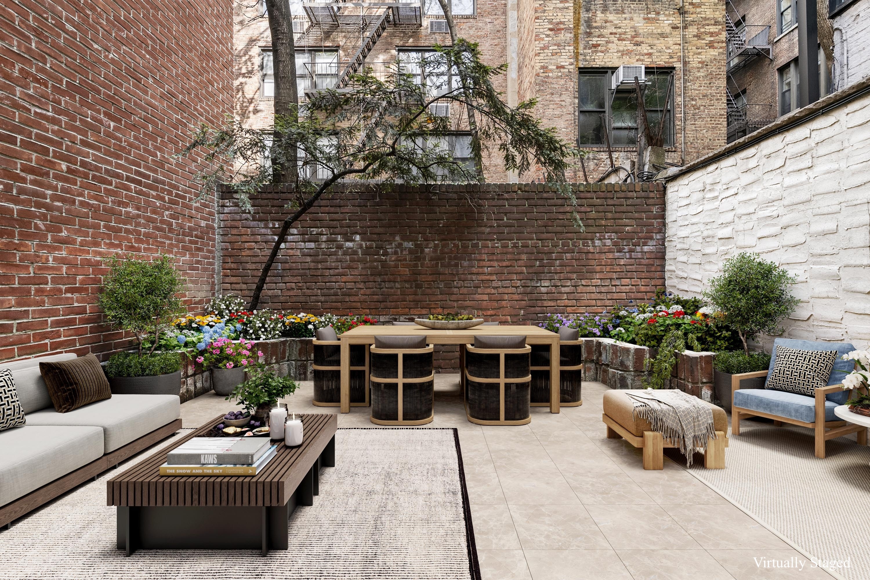 51 East 75th Street Manhattan, NY 10021 - Photo 3 of 22 a view of a patio with couches table and chairs with potted plants