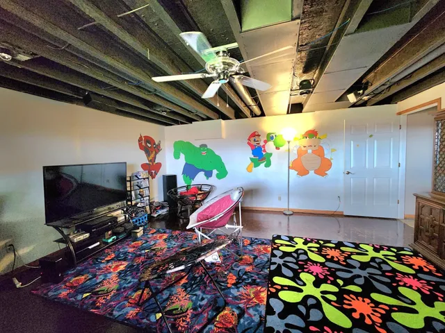 a view of a house with a yard and sitting area