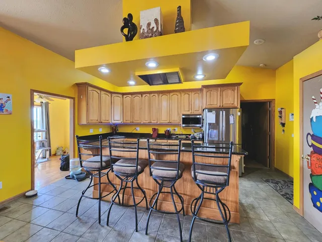 a view of a dining room with furniture
