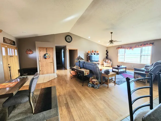 a bathroom with a toilet and a mirror