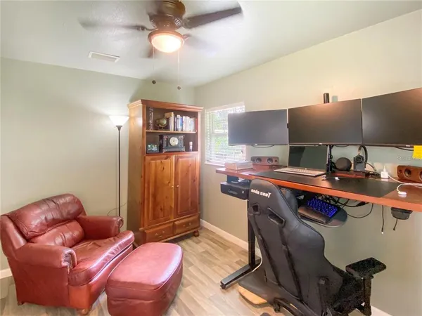a workspace with furniture and window