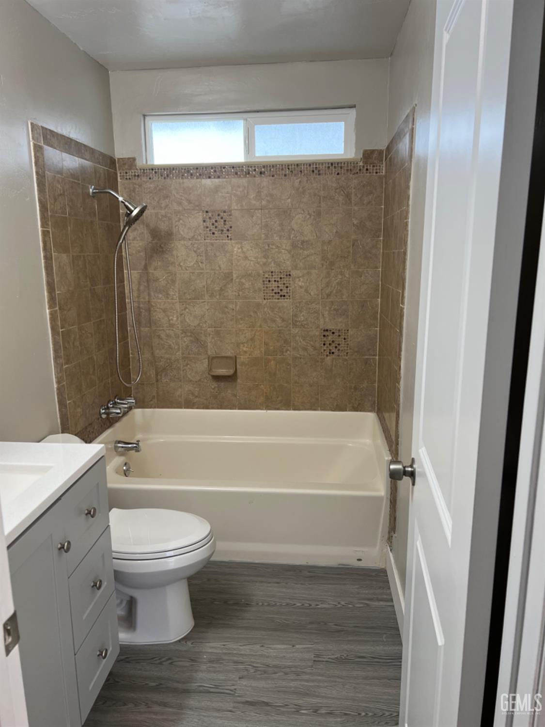 Undisclosed Address Bakersfield, CA 93308 - Photo 14 of 17 a bathroom with a sink toilet and shower