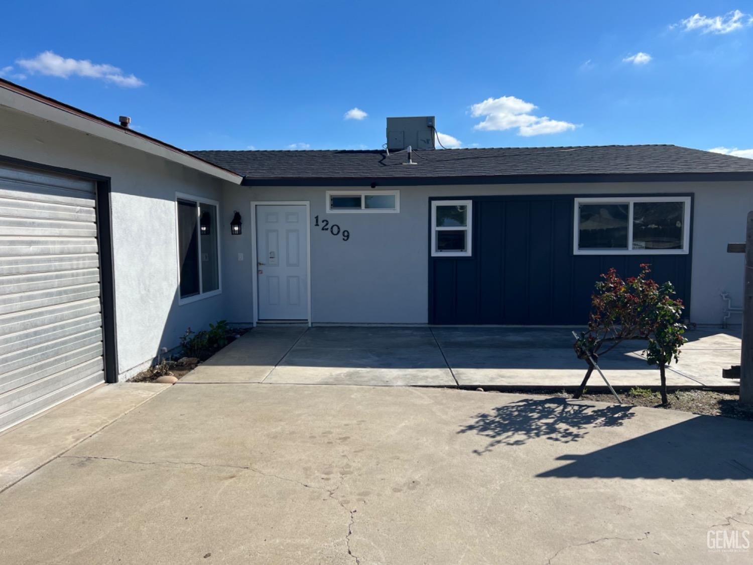 Undisclosed Address Bakersfield, CA 93308 - Photo 2 of 17 a view of a house with a patio
